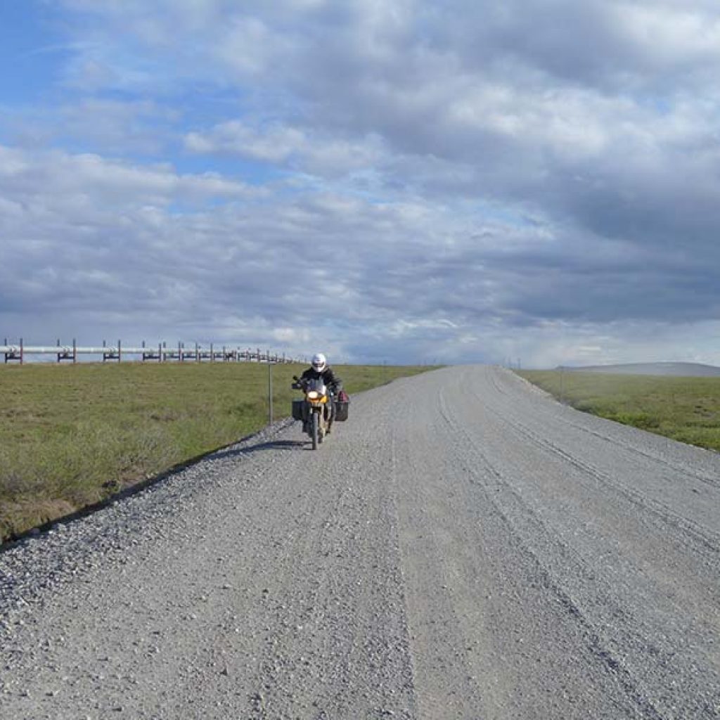 Riding Beside Oil Pipeline on Alaska's Haul Road