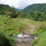 Wild Rider - Biker Crossing the Water