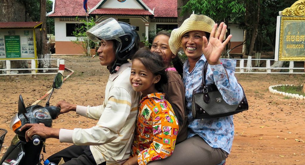 Motorcycle Touring in Southeast Asia - Family on Motorbike